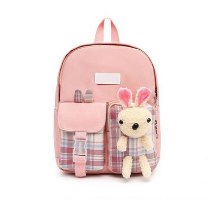 Sac à dos pour enfant décoré avec poupée