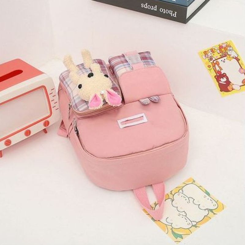 Sac à dos pour enfant décoré avec poupée